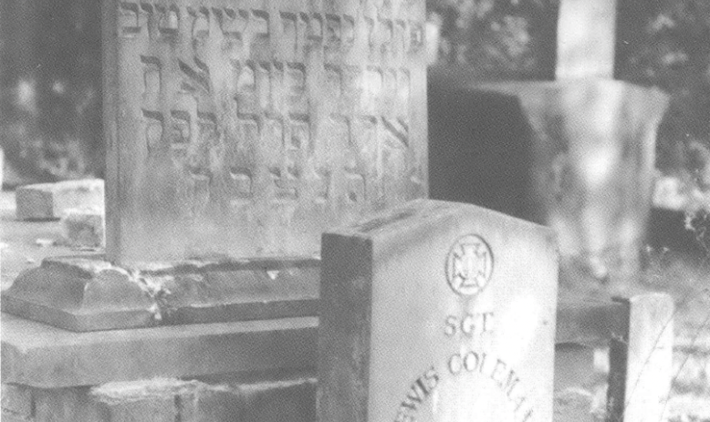 Black and white photo of two gravestones