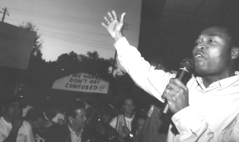 Man speaking to rally