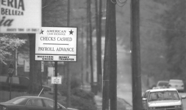 Sign that says Checks Cashed