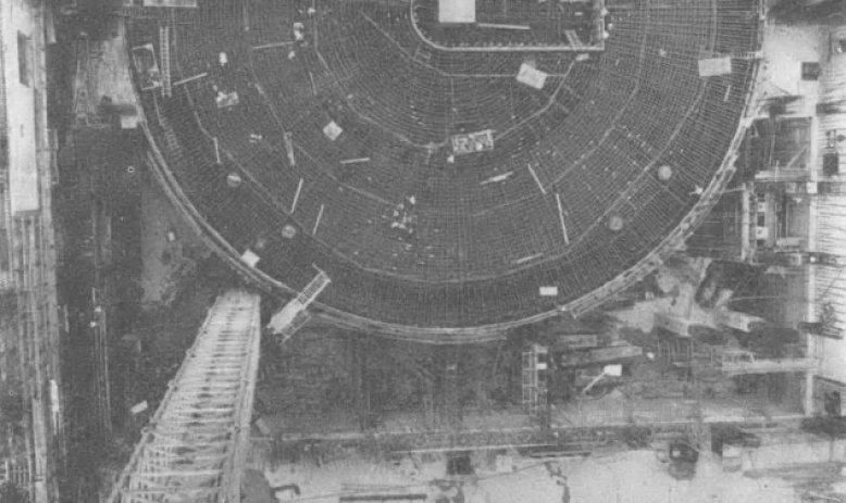 Black and white aerial view of circular building