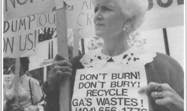 woman holding sign