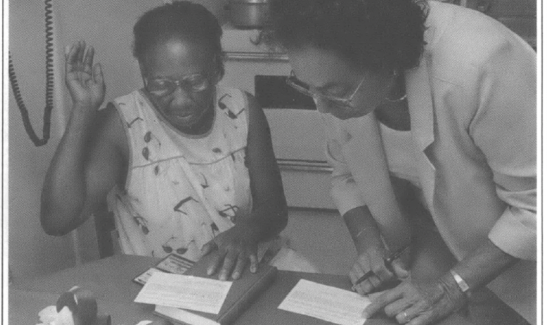 volunteer registering voter in her home