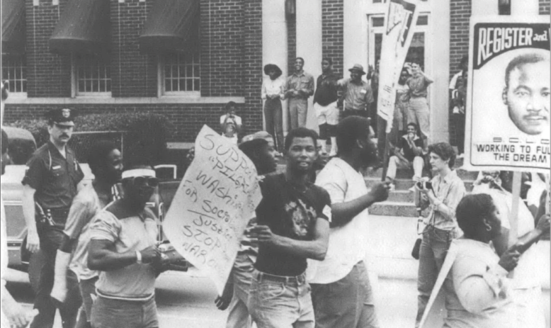 protesters marching and carrying signs - 1982 march for jobs, peace and justice