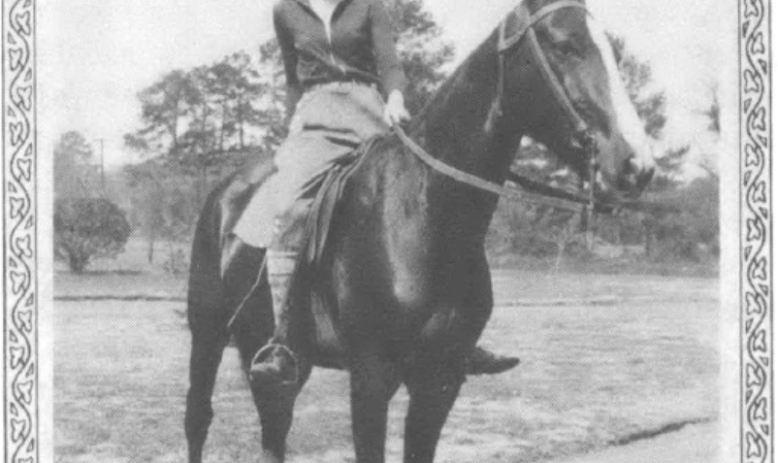 photograph of young woman on a horse