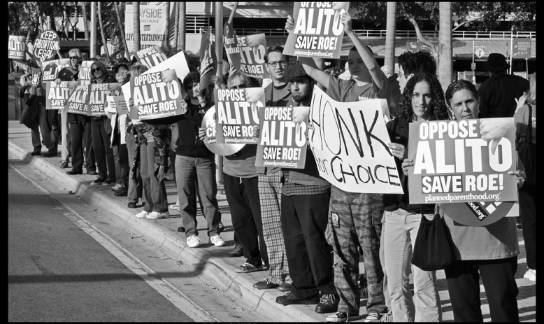 People protest against the nomination of Judge Samuel Alito to the Supreme Court in 2006