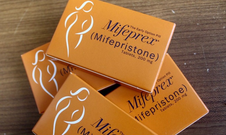 orange boxes containing Mifeprex, the name brand for mifepristone, an abortion pill 