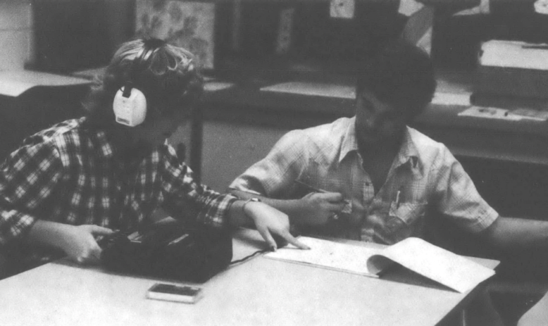 Pam Nix (left) and Randy McFalls check the transcription of an interview they did with Pam’s grandmother, Lillian Nix