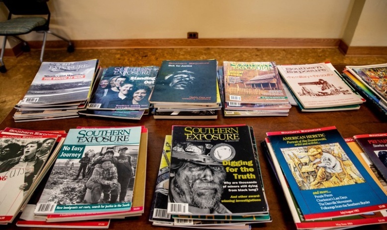Stacks of Southern Exposure issues on a table