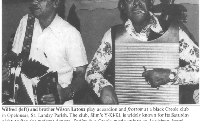 black and white photograph of two Black Creole men playing instruments