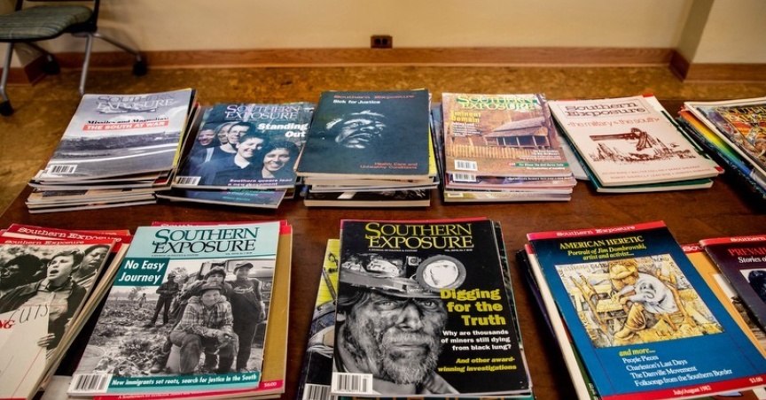Stacks of Southern Exposure issues on a table