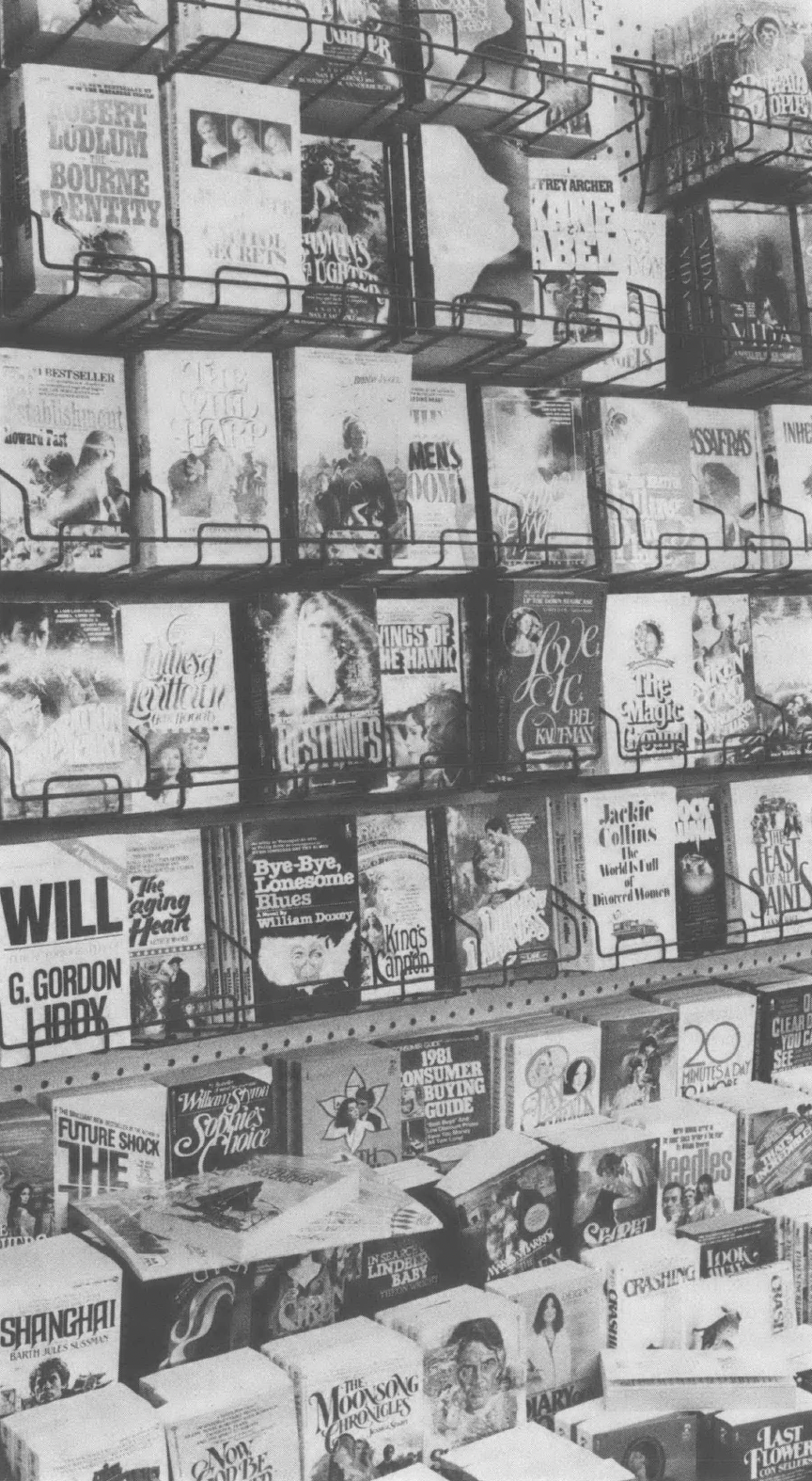 Black and white photo of bookshelf at bookstore