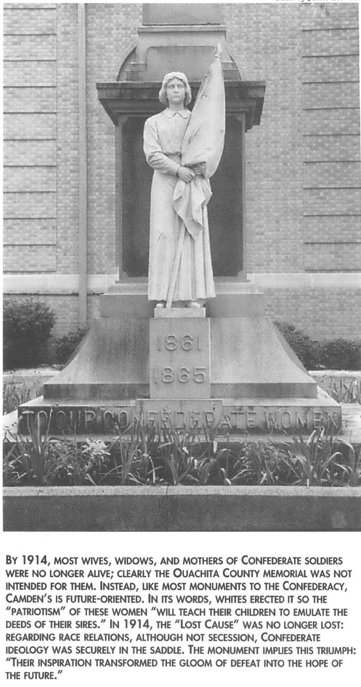 Statue of woman holding flag