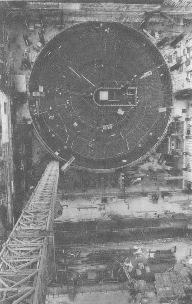 Black and white aerial view of circular building