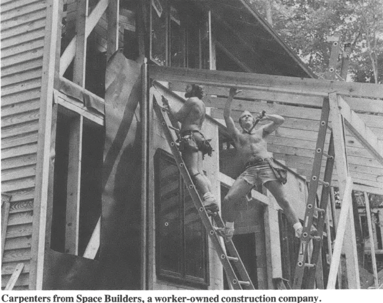 People building a house