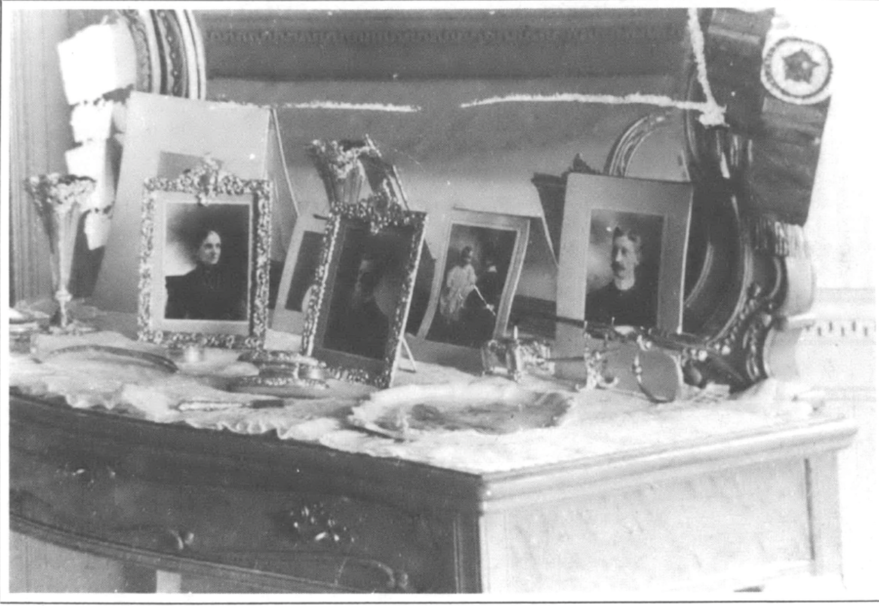 photo frames on a nightstand/dresser