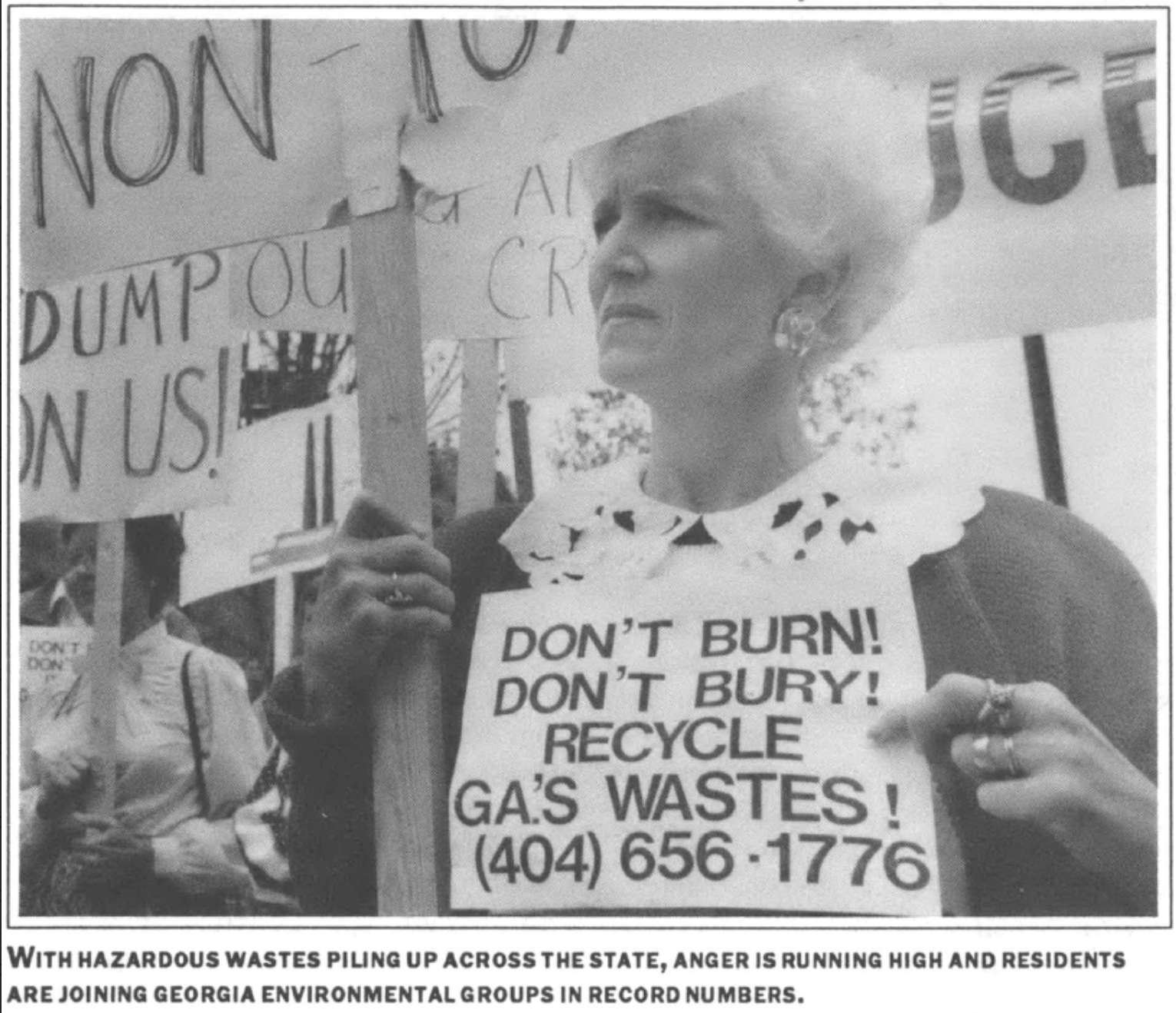 woman holding sign