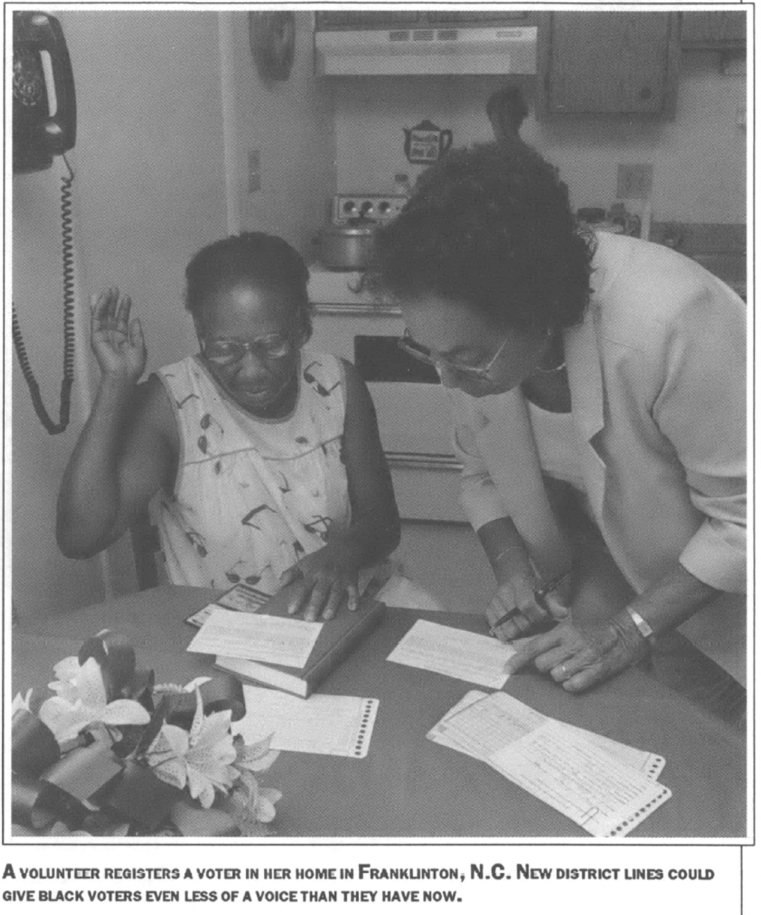 volunteer registering voter in her home