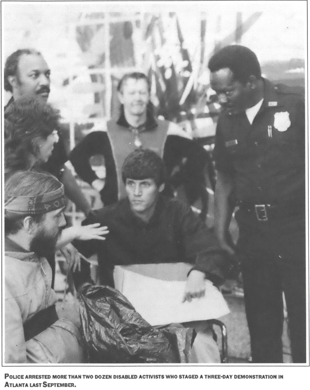 police interacting with disability activists