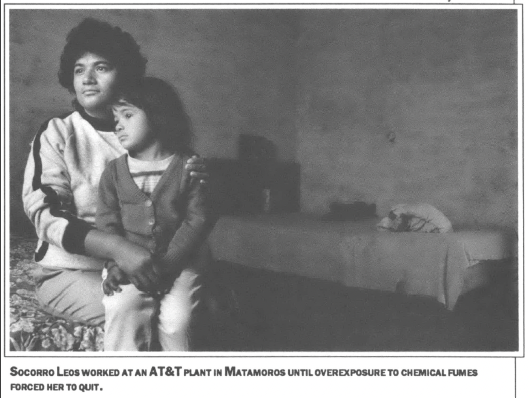 former at&t plant worker with child on her lap