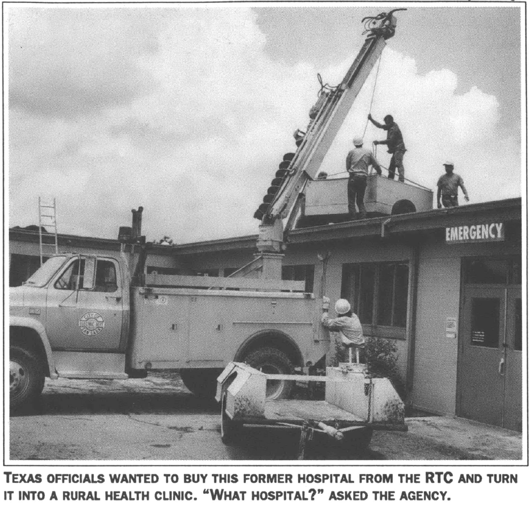 Utility truck in front of building 
