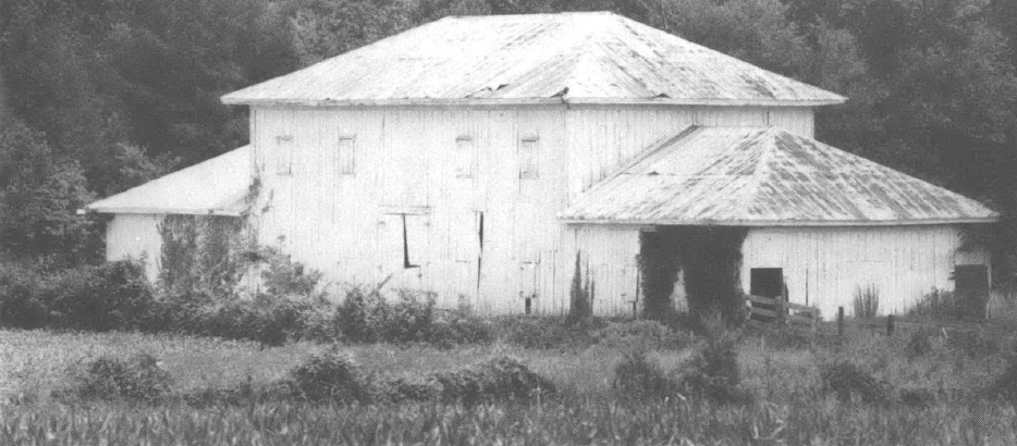 Black and white photo of large white building