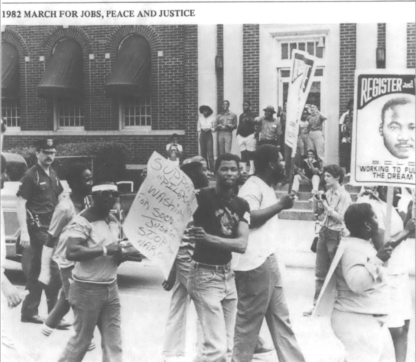 protesters marching and carrying signs - 1982 march for jobs, peace and justice