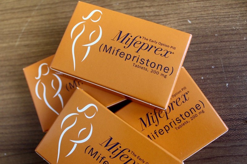 orange boxes containing Mifeprex, the name brand for mifepristone, an abortion pill 
