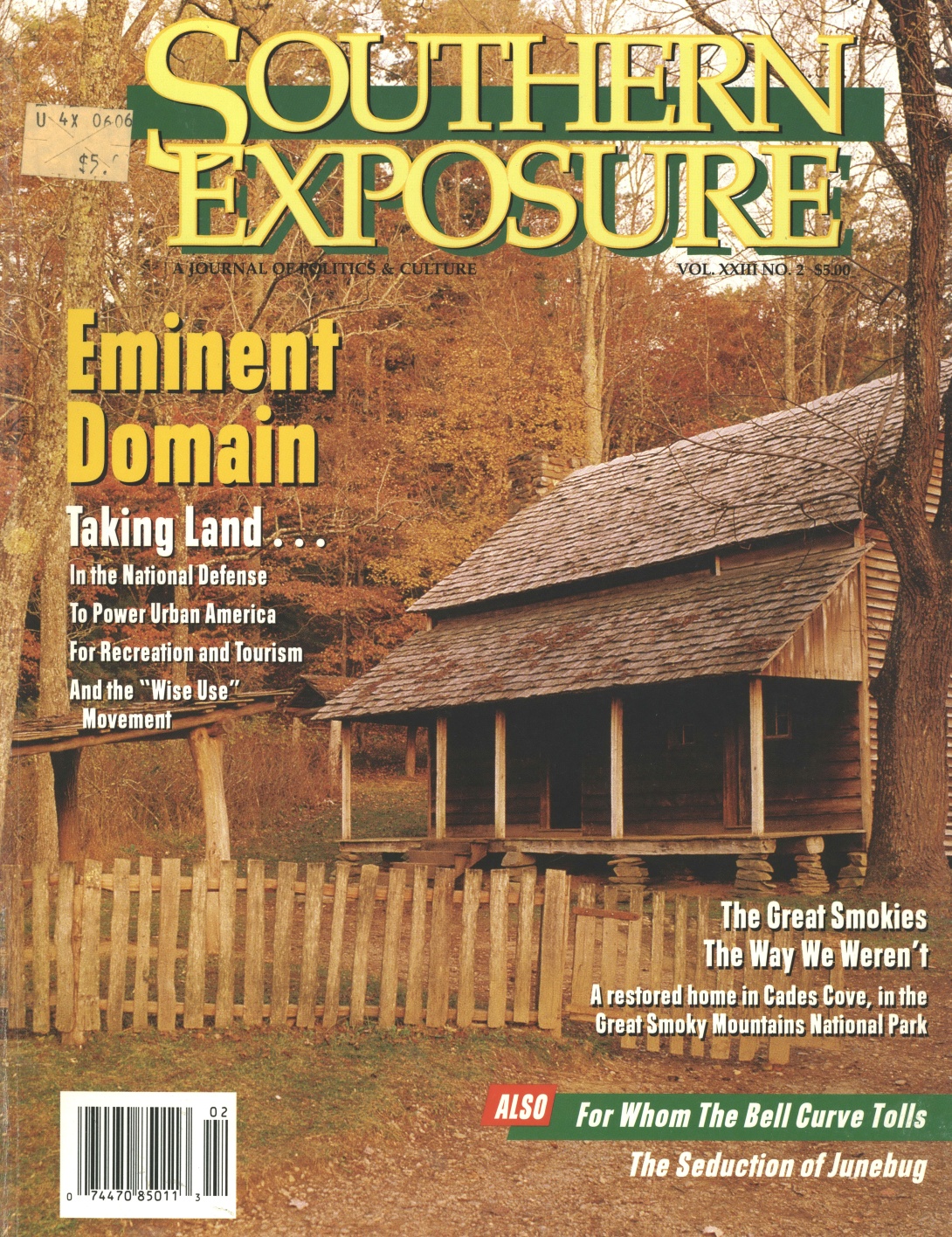 Magazine cover with photo of cabin in forest and pasture, text reads "Eminent Domain"