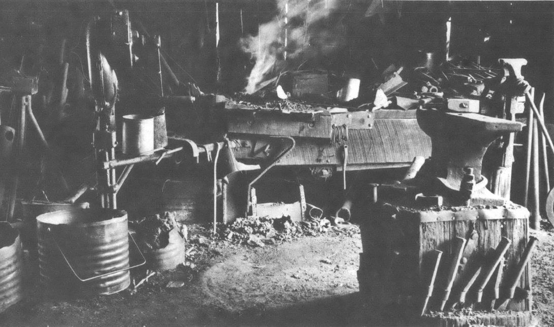 Black and white photo of tools and workshop