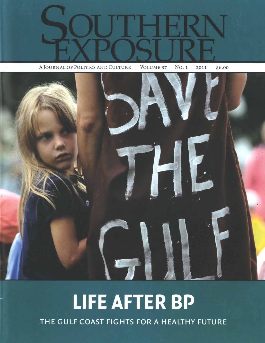 Magazine cover with photo of young girl holding on to woman whose shirt reads "Save the Gulf." Cover text reads "Life After BP: The Gulf Coast Fights for a Healthy Future"