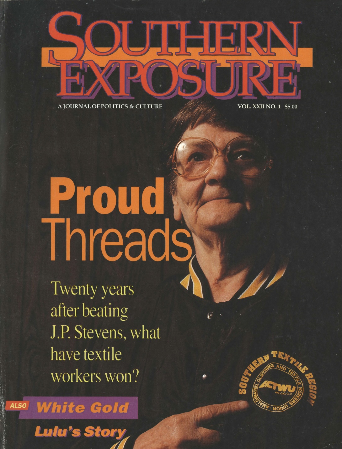 Magazine cover with photo of woman pointing to union logo on shirt, text reads "Proud Threads: Twenty years after beating JP Stevens, what have textile workers won?"