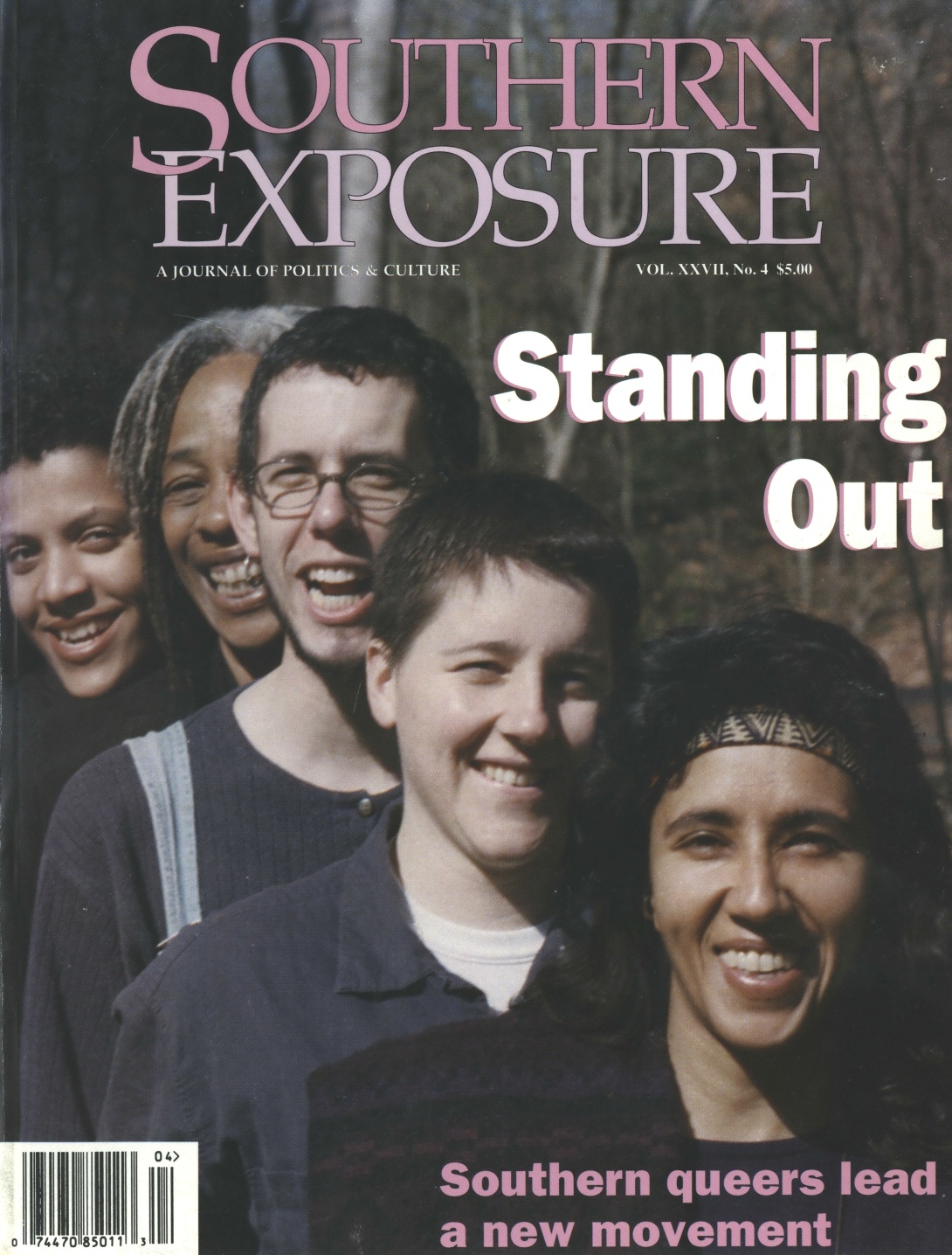 Magazine cover with five people standing in a diagonal line and smiling at camera